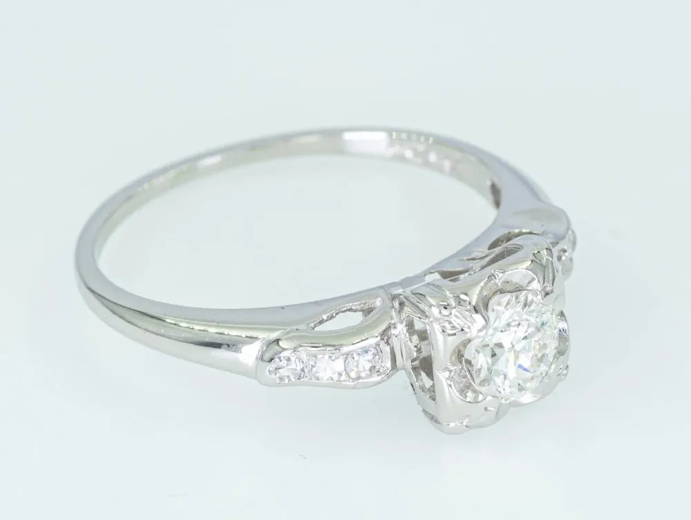 Хало пръстен от 14-каратово бяло злато и диаманти 0,54 ct