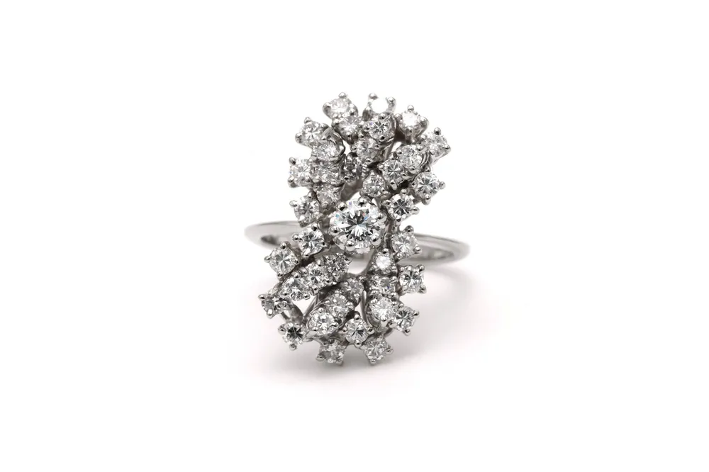 Съвременен пръстен от бяло злато, инкрустиран с диаманти (+-1.36ct)