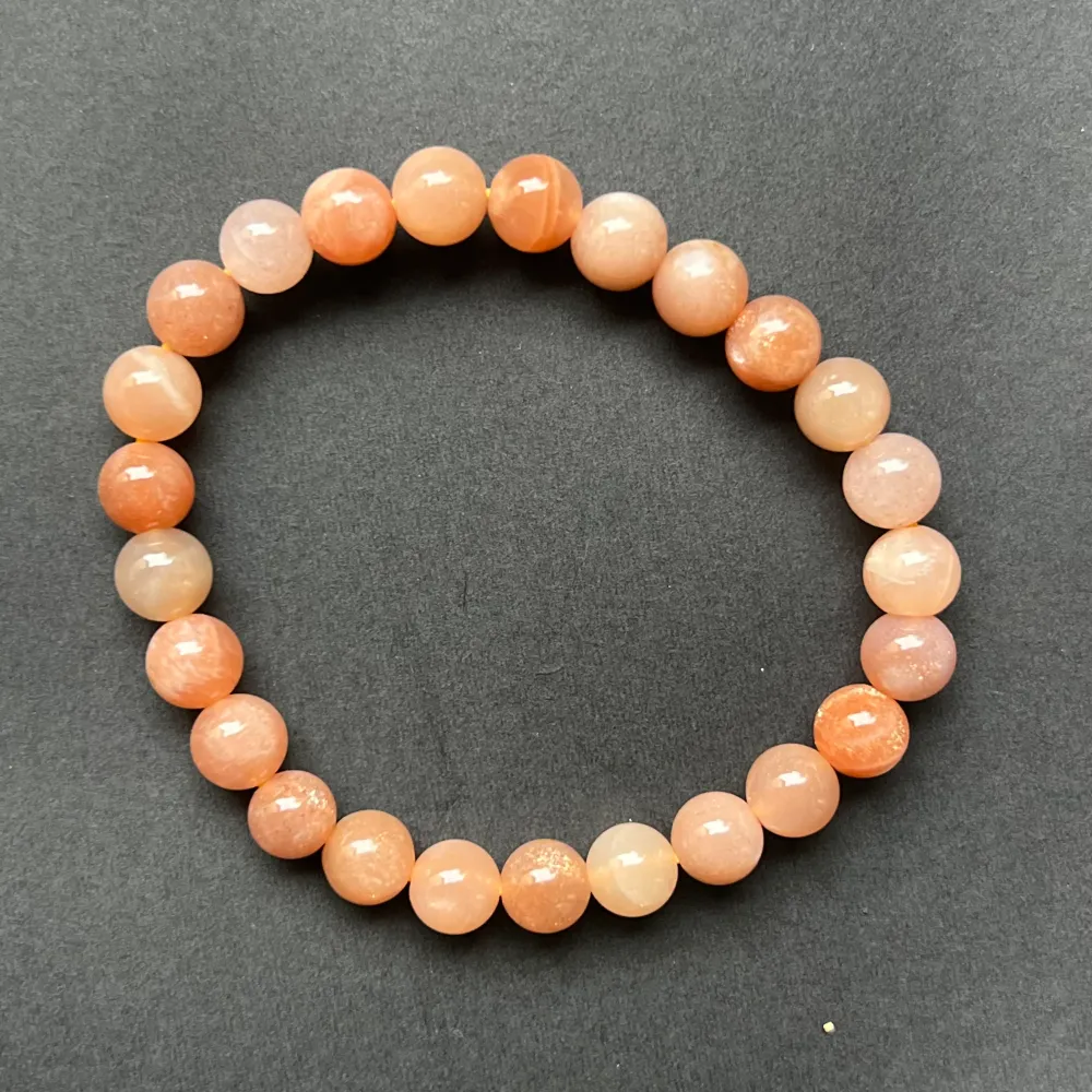 Гривна от лунен камък сфери сьомга 8 мм