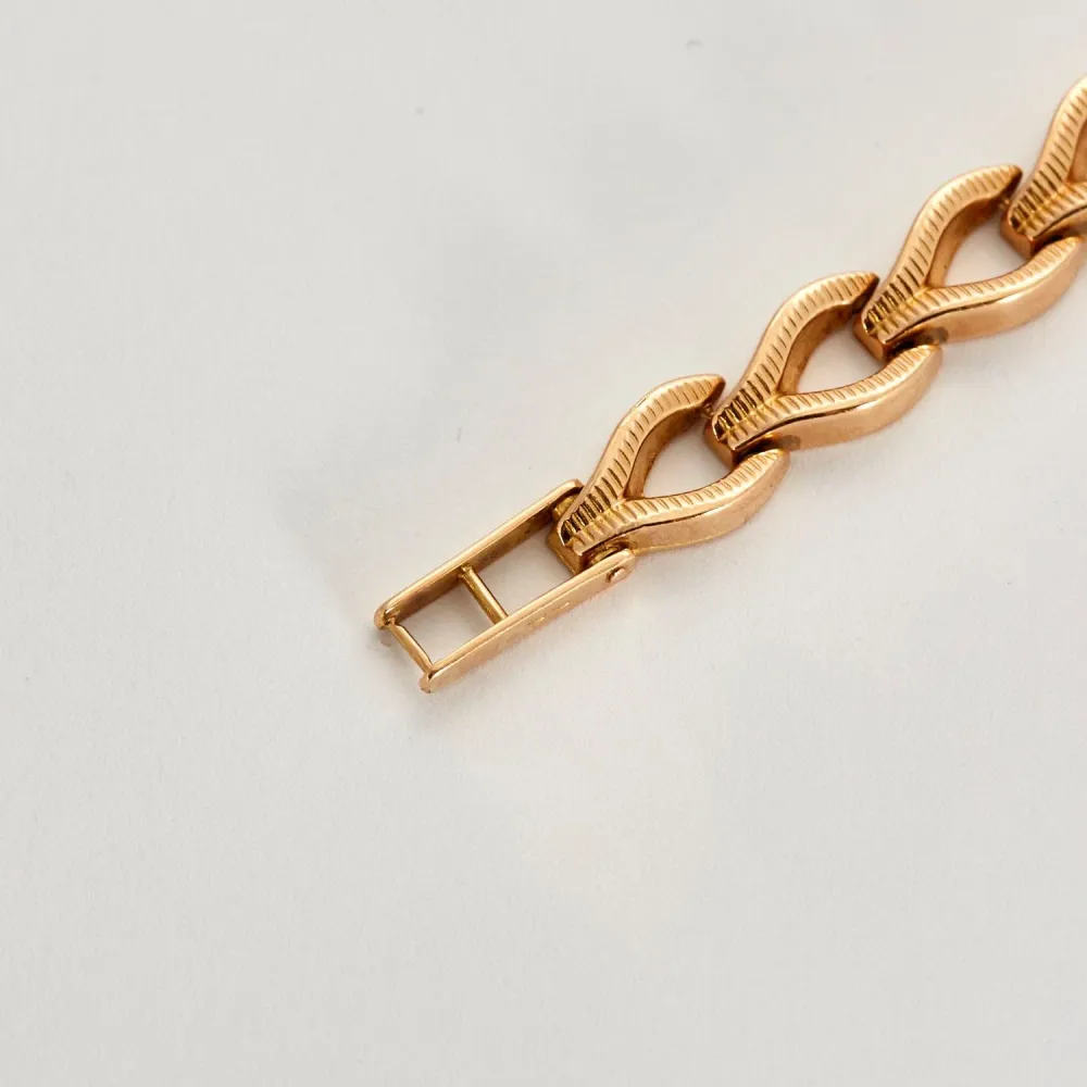 Часовник от розово злато