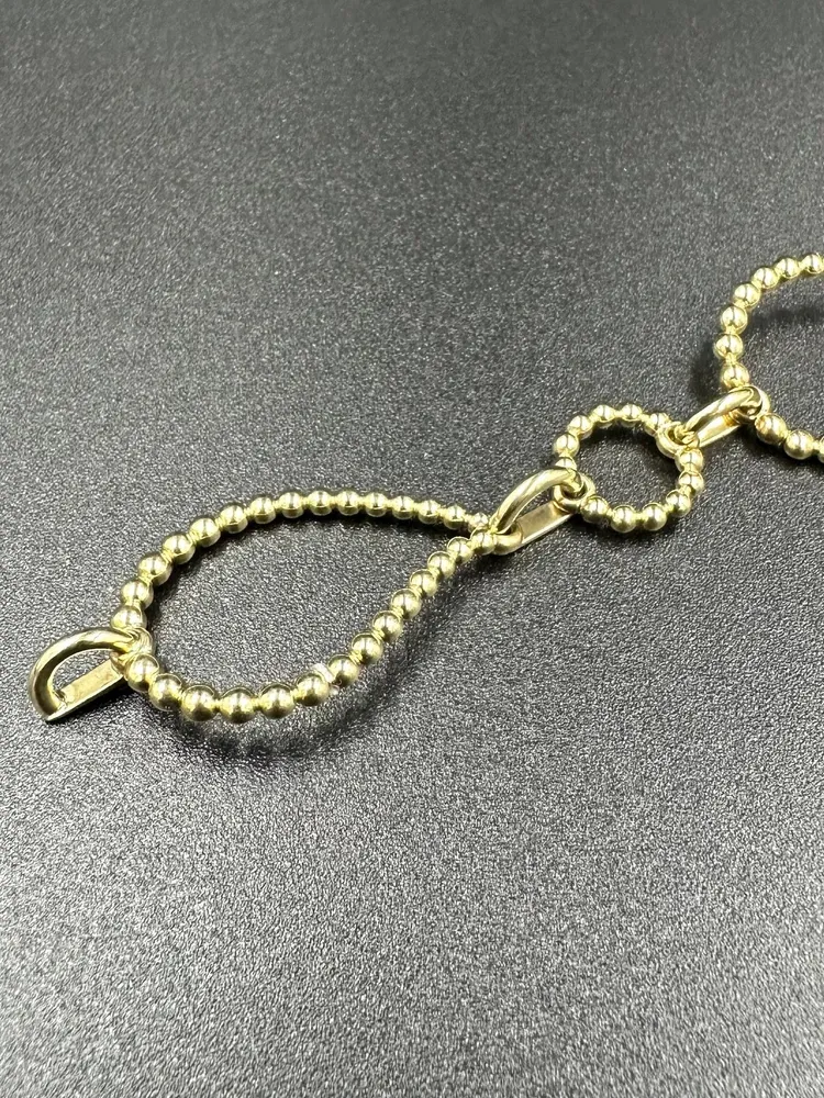 BUCHERER. Гривна Bubbles от 18K жълто злато