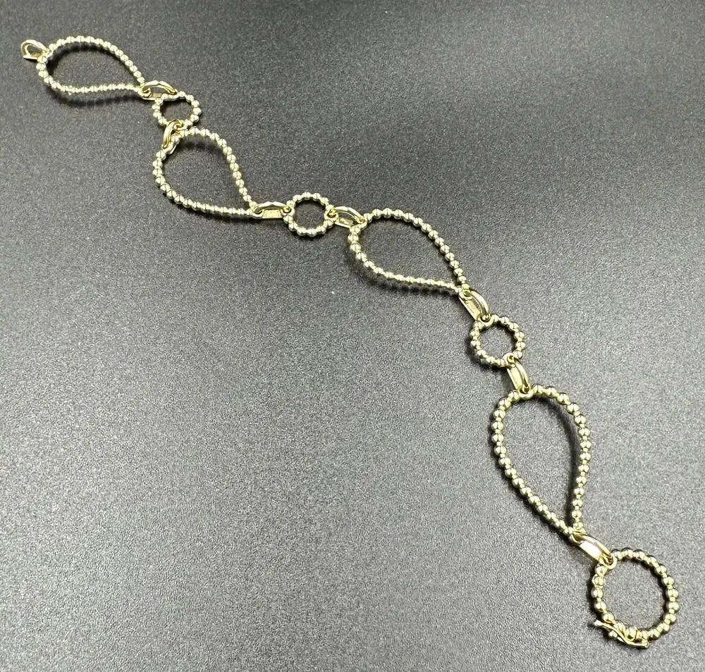 BUCHERER. Гривна Bubbles от 18K жълто злато