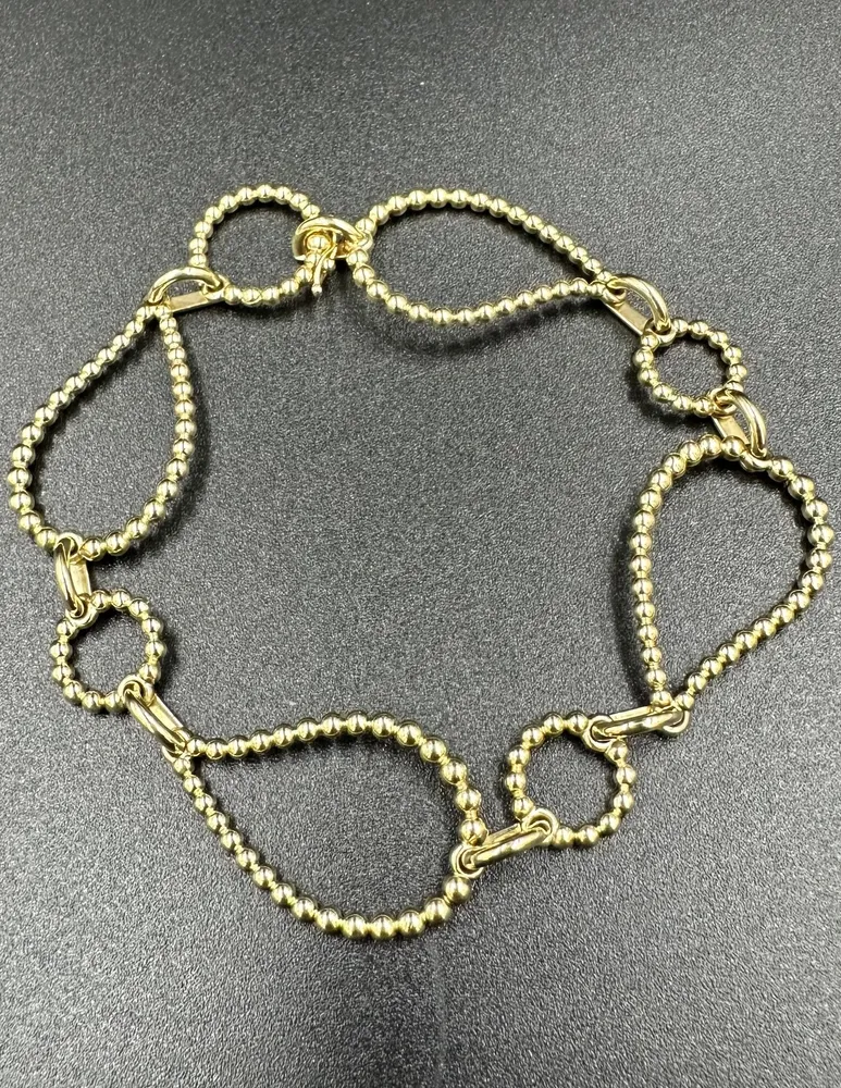 BUCHERER. Гривна Bubbles от 18K жълто злато