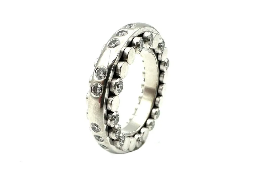 BUCHERER. Пръстен "Dizzler" от бяло злато 18K и диаманти
