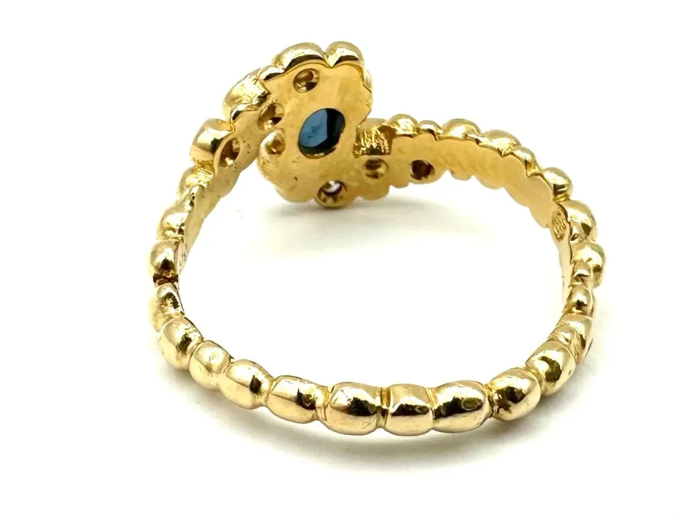GILBERT ALBERT. Пръстен от 18K жълто злато, сапфир и диаманти